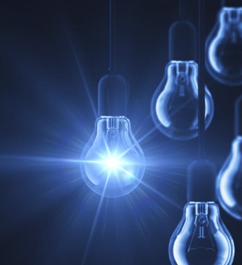 Lightbulbs against a dark blue background