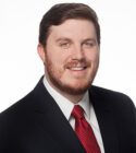Professional headshot of attorney, Brad Carroll
