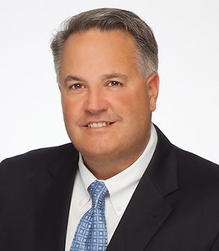 Professional headshot of attorney, Michael Thomas