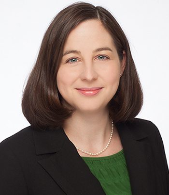 Professional headshot of attorney, Kelly Pope