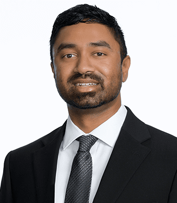 Professional headshot of attorney, Joshua Dalavai