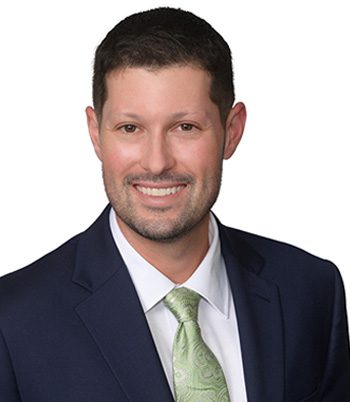 Professional headshot of attorney, Sam Bivins